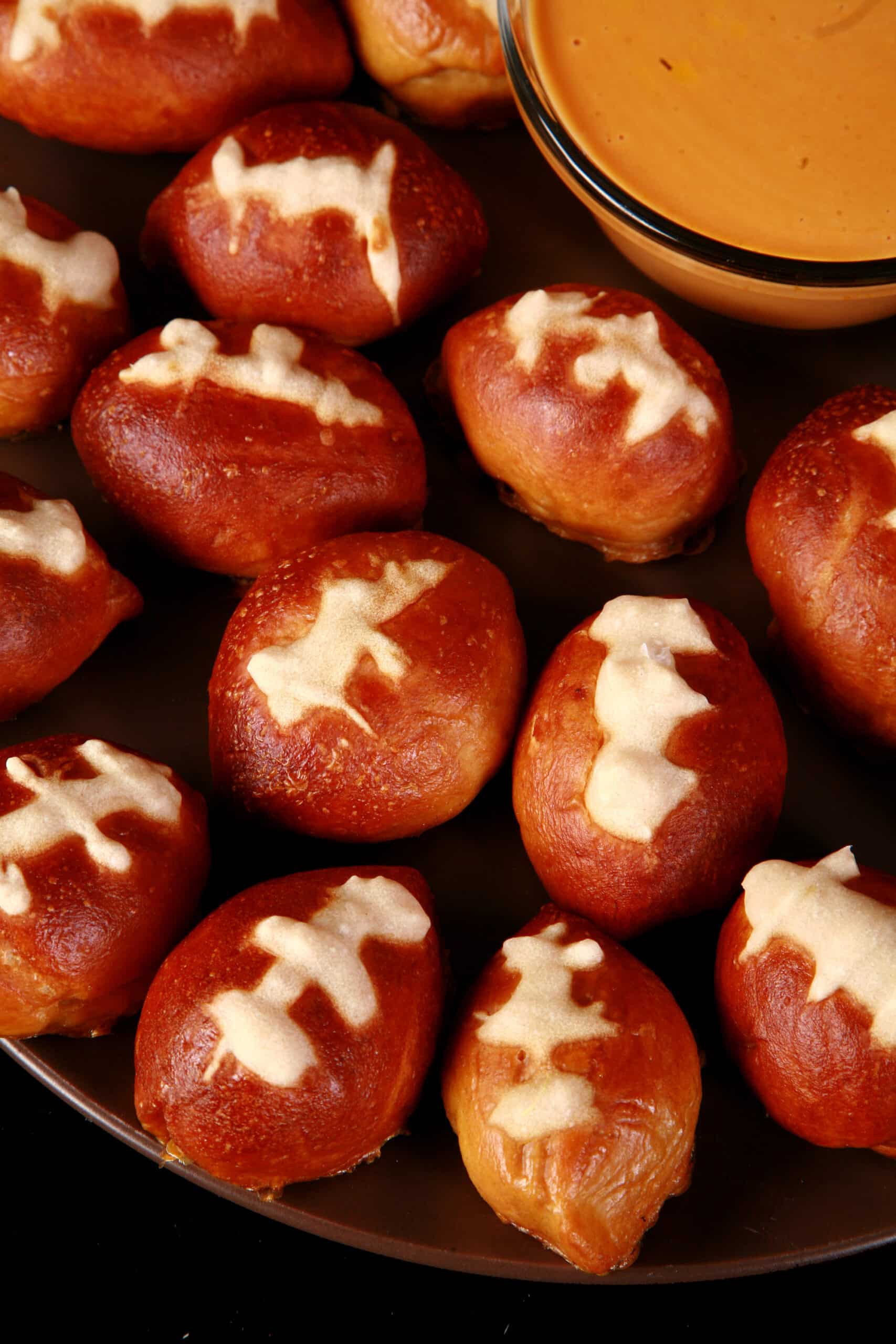 A plate of mini football shaped pretzel bites.