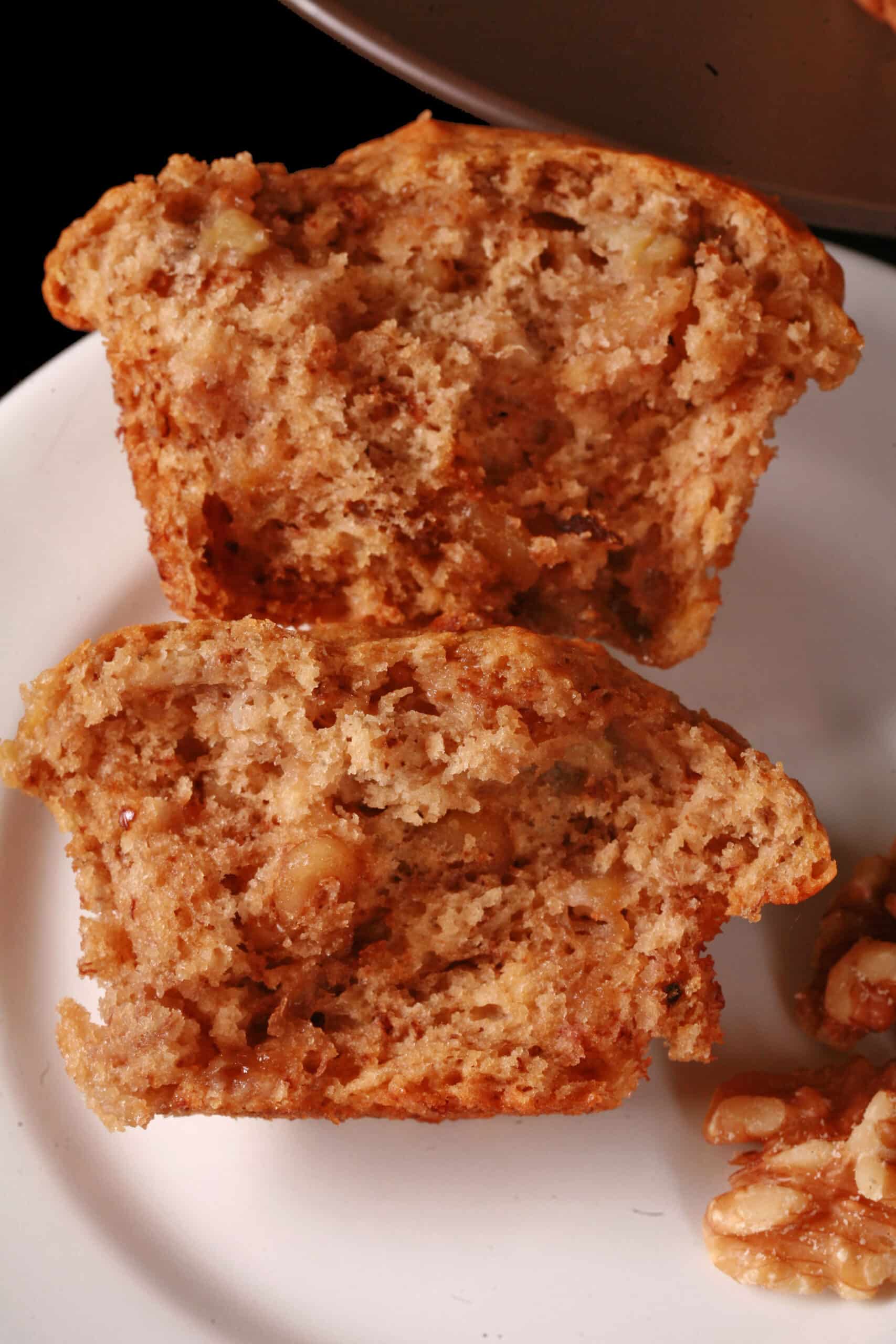 A plate of moist and fluffy egg free banana muffins.