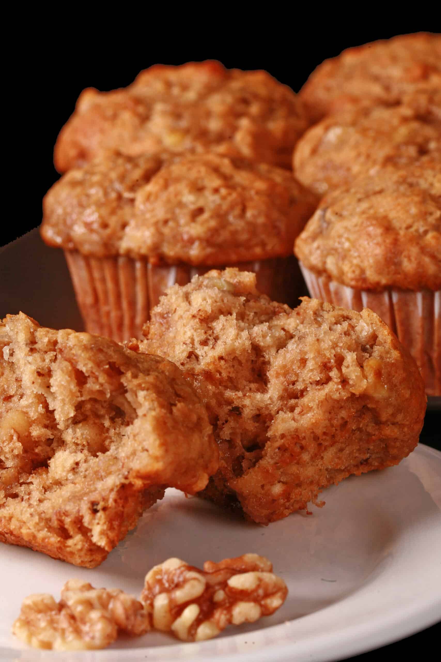 A plate of moist and fluffy egg free banana muffins.