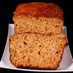 A sliced loaf of high protein banana bread.