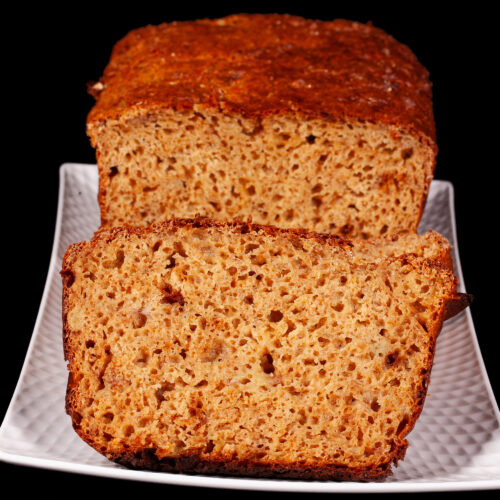 A sliced loaf of high protein banana bread.