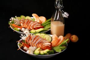 2 Asian chicken salad bowls with lychee vinaigrette.